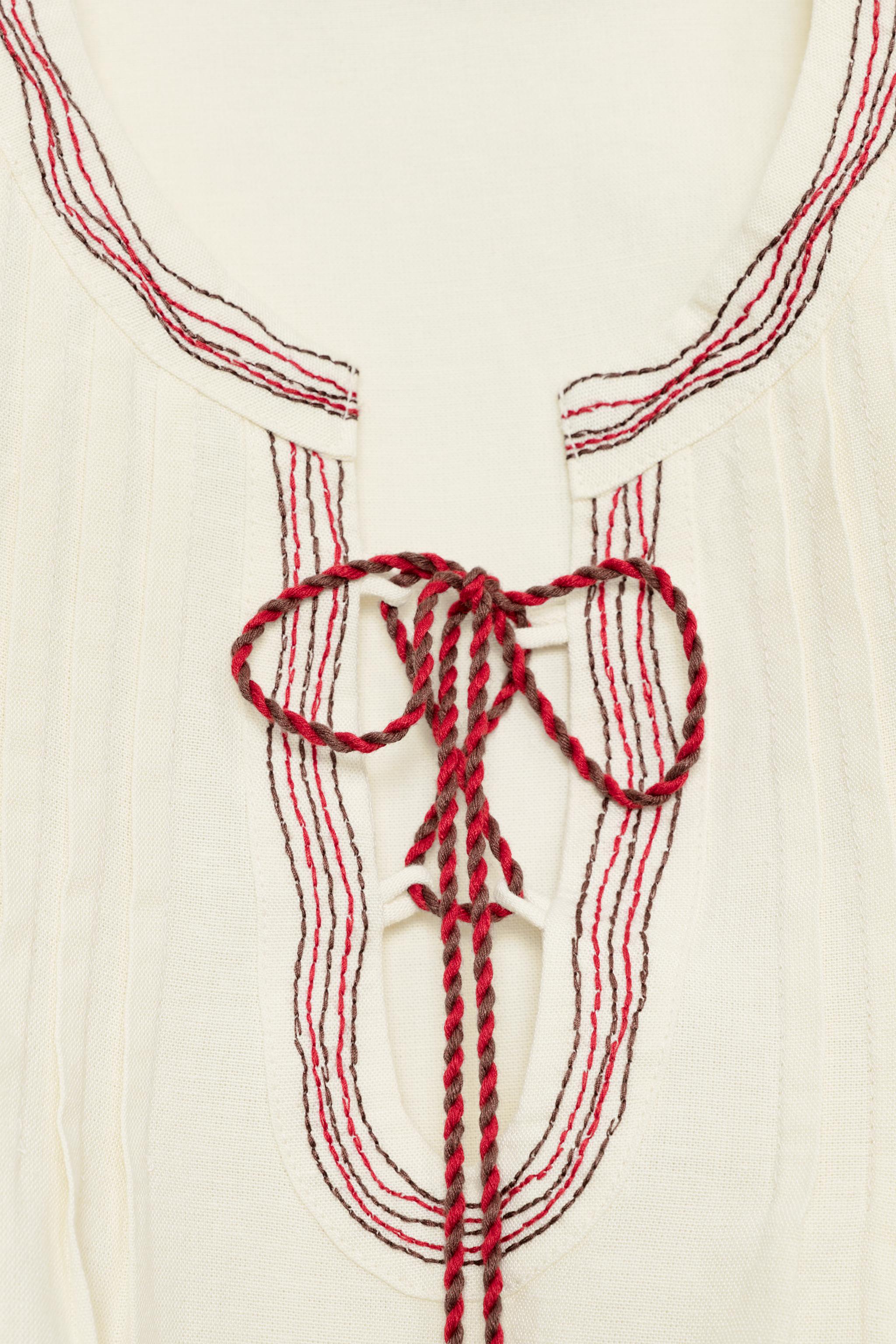 EMBROIDERED TASSEL BLOUSE